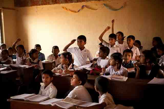 Representative image of a classroom full of students in a school