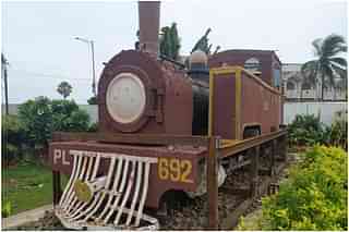 The old steam loco outside BNR Hotel in Puri now lies rusted, neglected.