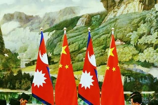 Nepal and China flags (Lintao Zhang/Pool/GettyImages) 