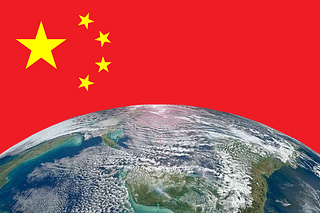 (Chinese flag over earth - file graphics)