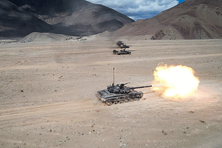 Indian Army tanks fire during an exercise in Ladakh.