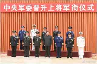 Chinese President Xi Jinping with the promoted generals.