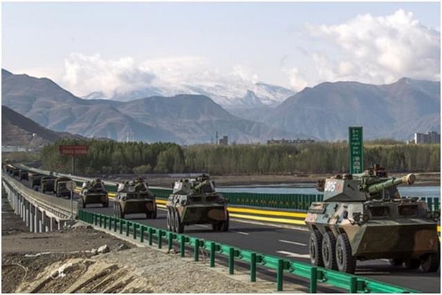 Chinese tanks on a road in Tibet.  