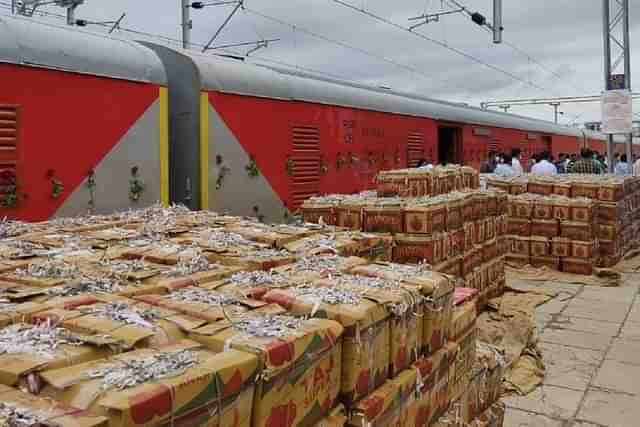 Goods being loaded on to locomotives. (Central Railway)