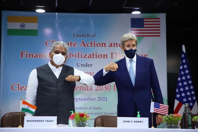 India's Environment Minister Bhupender Yadav and US climate envoy John Kerry (Pic Via Twitter)