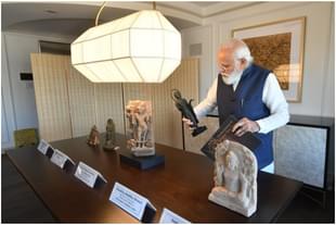 PM Modi taking a look at ancient Indian artefacts housed in the US
