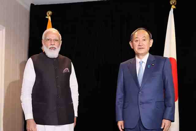 Prime Minister Narendra Modi with Suga Yoshihide, Prime Minister of Japan (@EOJinIndia/Twitter)