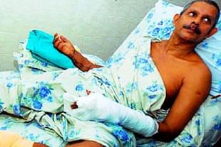 Prof T J Joseph in hospital after the attack on him.