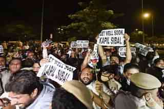 Protests outside the home of Kapil Sibal (Image via Twitter)