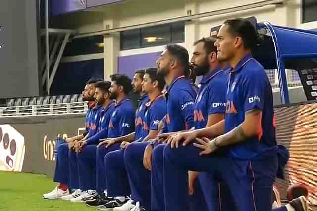 (Indian cricket team 'takes a knee'.)