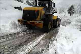 Snow being cleared as part of the rescue operation.