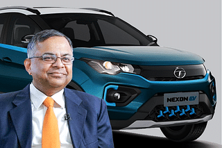 Tata Sons’ chairman N Chandrasekaran with Tata Motor's EV Nexon in background (An illustration by SwarajyaMag)