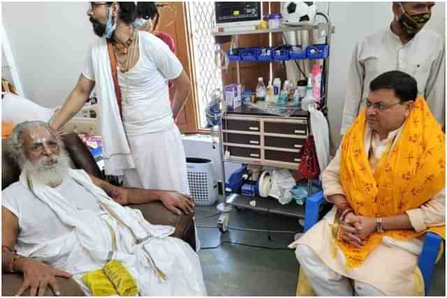 Uttarakhand CM Pushkar Singh Dhami meeting Shri Nritya Gopal Das, chairman of the Shri Ram Janmabhoomi Teerth Kshetra Trust. 