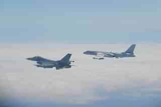 Taiwan’s F-16 fighter (left) flies alongside China’s H-6 bomber 