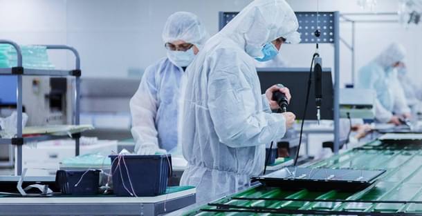 Assembling a TV panel at the Super Plastronics plant in Noida.