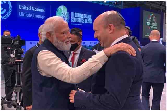 PM Modi greeting Israel's new PM Naftali Bennett at Glasgow. 