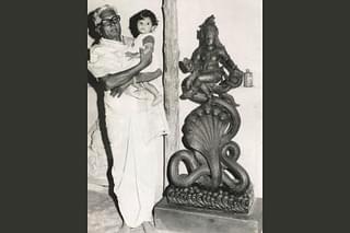 Young Arun with his grandfather and Mysuru Royal Palace Sculptor B Basavanna Shilpa.