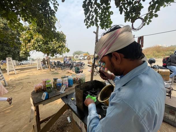 A tea vendor at the plot