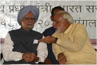 Manmohan Singh (L) and Narendra Modi (SAM PANTHAKY/AFP/Getty Images))
