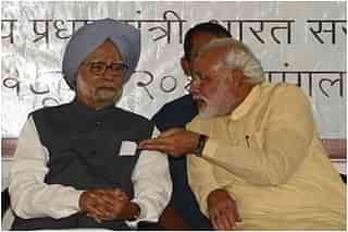Manmohan Singh (L) and Narendra Modi (SAM PANTHAKY/AFP/Getty Images)) 