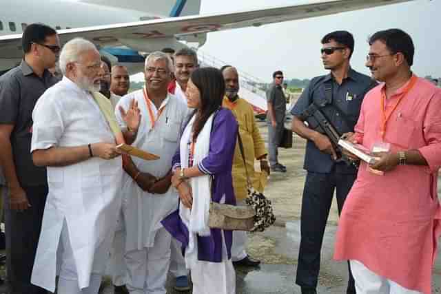 Imsong speaks with Prime Minister Narendra Modi.