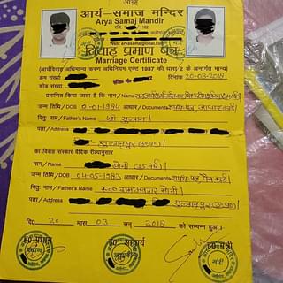 The Arya Samaj-issued marriage certificate. personal details hidden by Swarajya