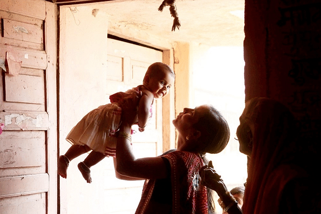 A mother playing with a girl child (Sattish Bate/Hindustan Times via Getty Images)