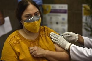 A woman getting vaccinated