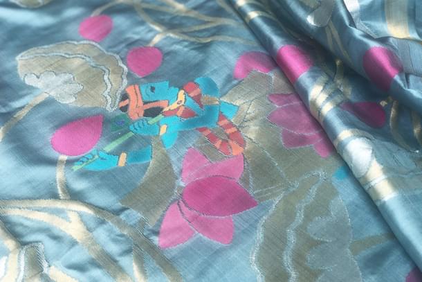 Krishna with flowers in the background. (Madhurya Creations)