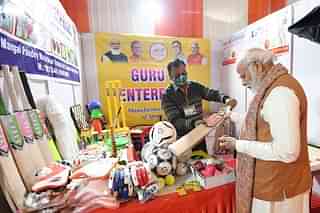 PM Modi inspecting the sports equipment manufactured in Meerut (PMO India)