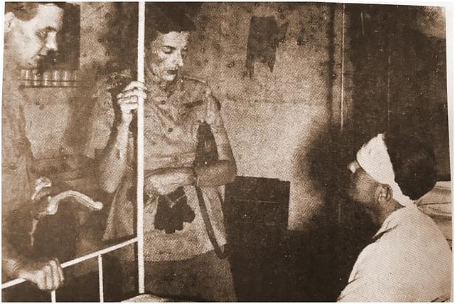 Edwina Mountbatten talking to a patient in a hospital in Saigon (Vol XIII Official History of the Indian Armed Forces in WWII)