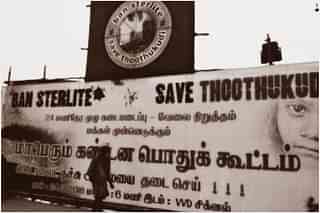 A hoarding announcing protest.