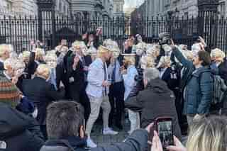 Protestors outside 10 Downing Street dressed up as Boris Johnson 
