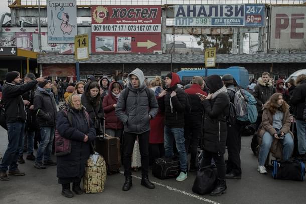 Residents in Kyiv lining up in a bus station to move towards the western region of the country | Credits: New York Times