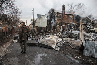 Ukrainian forces walking near a downed aircraft in Kyiv | Credits: Associated Press 