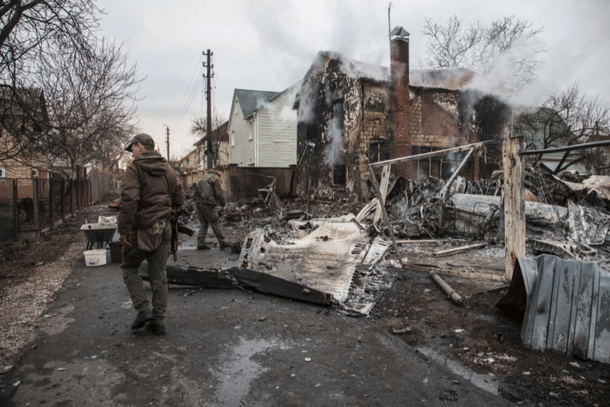 Ukrainian forces walking near a downed aircraft in Kyiv | Credits: Associated Press
