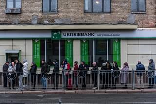 People queuing outside an ATM in Kyiv | Credits: New York Times 