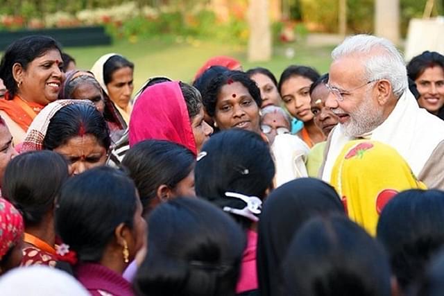Prime Minister Modi with women. (representative image)