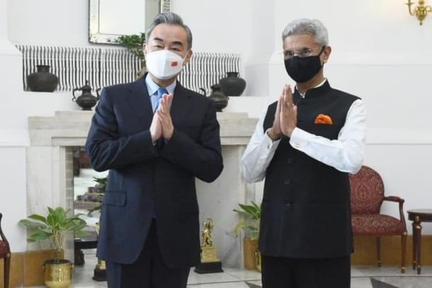 Chinese FM Wang Yi with EAM S Jaishankar (Pic Via Twitter)