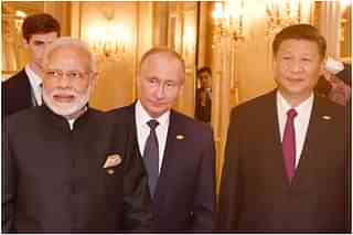 Narendra Modi, Vladimir Putin and Xi Jinping. 