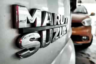 A Maruti Suzuki logo.