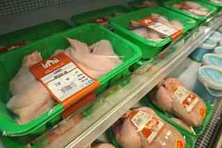 Packaged halal meat on a supermarket shelf.
