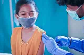 A child get inoculated 