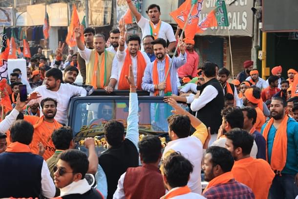 Union Minister Anurag  Thakur campaining with Member of Parliament Tejasvi Surya.