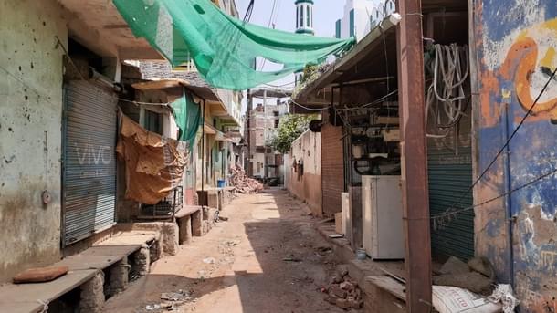 The passage beside the Mosque which leads to the second entrance, pieces of bricks at the corners were still seen