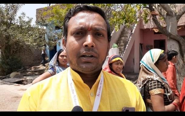 A volunteer from the food distribution drive