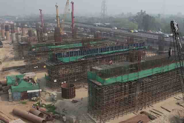 Work on the foot over bridge in progress.