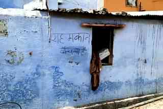 Wall of a house in Khargone reads, ‘this house is for sale’