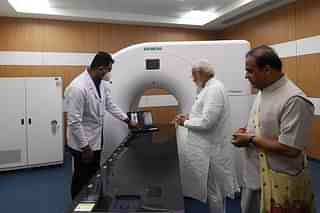 Prime Minister Narendra Modi and Assam Chief Minister Himanta Biswa Sarma at Dibrugarh Cancer Centre.