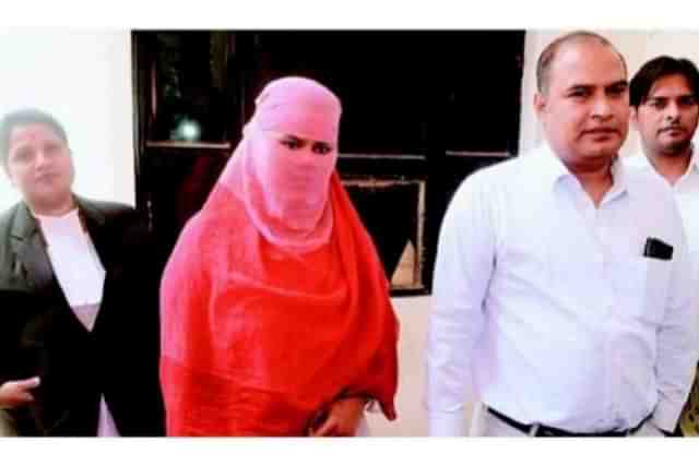 Victim Hemlata with her lawyers in court.